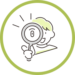 虫眼鏡を覗いている子供